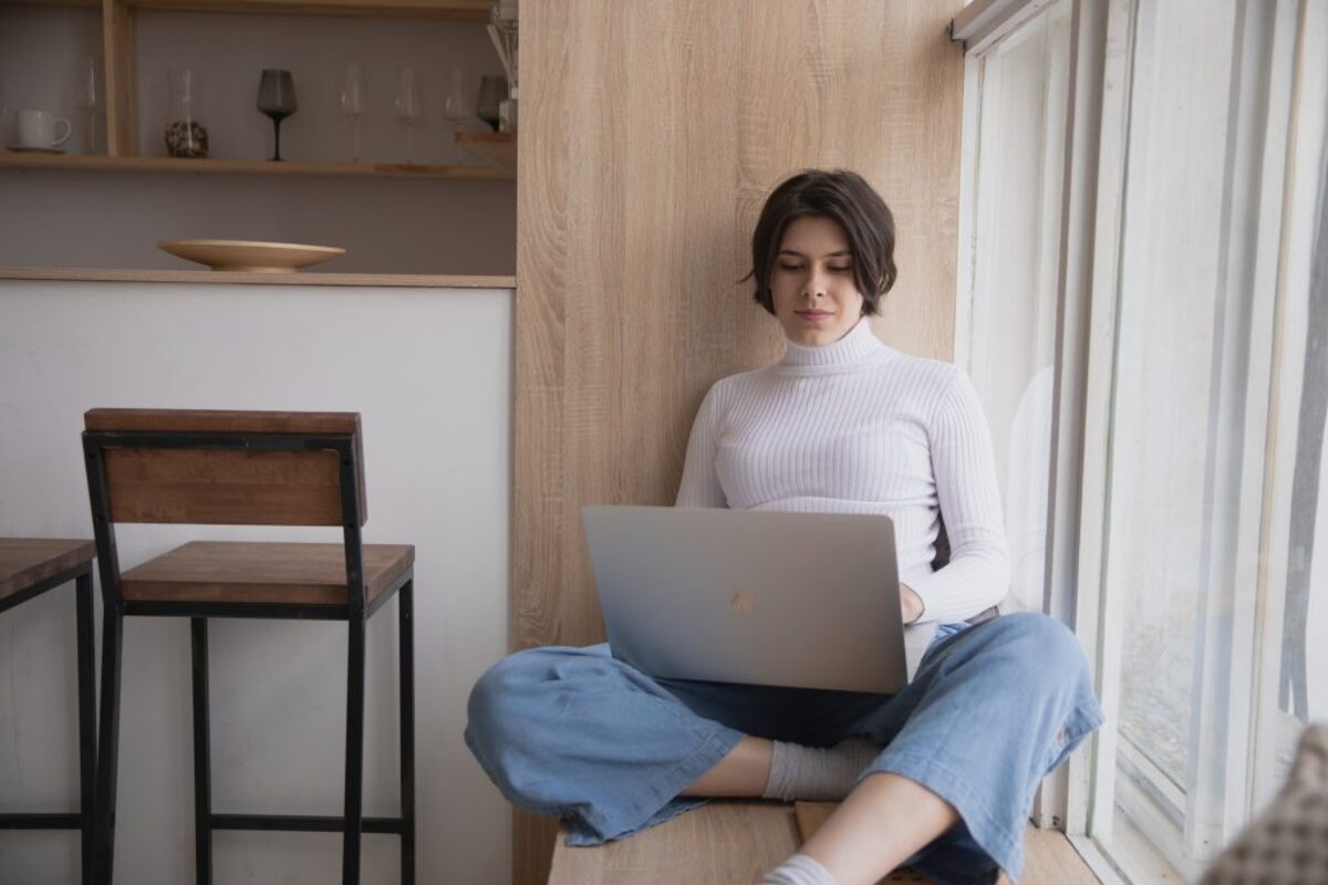 Woman reading from laptop