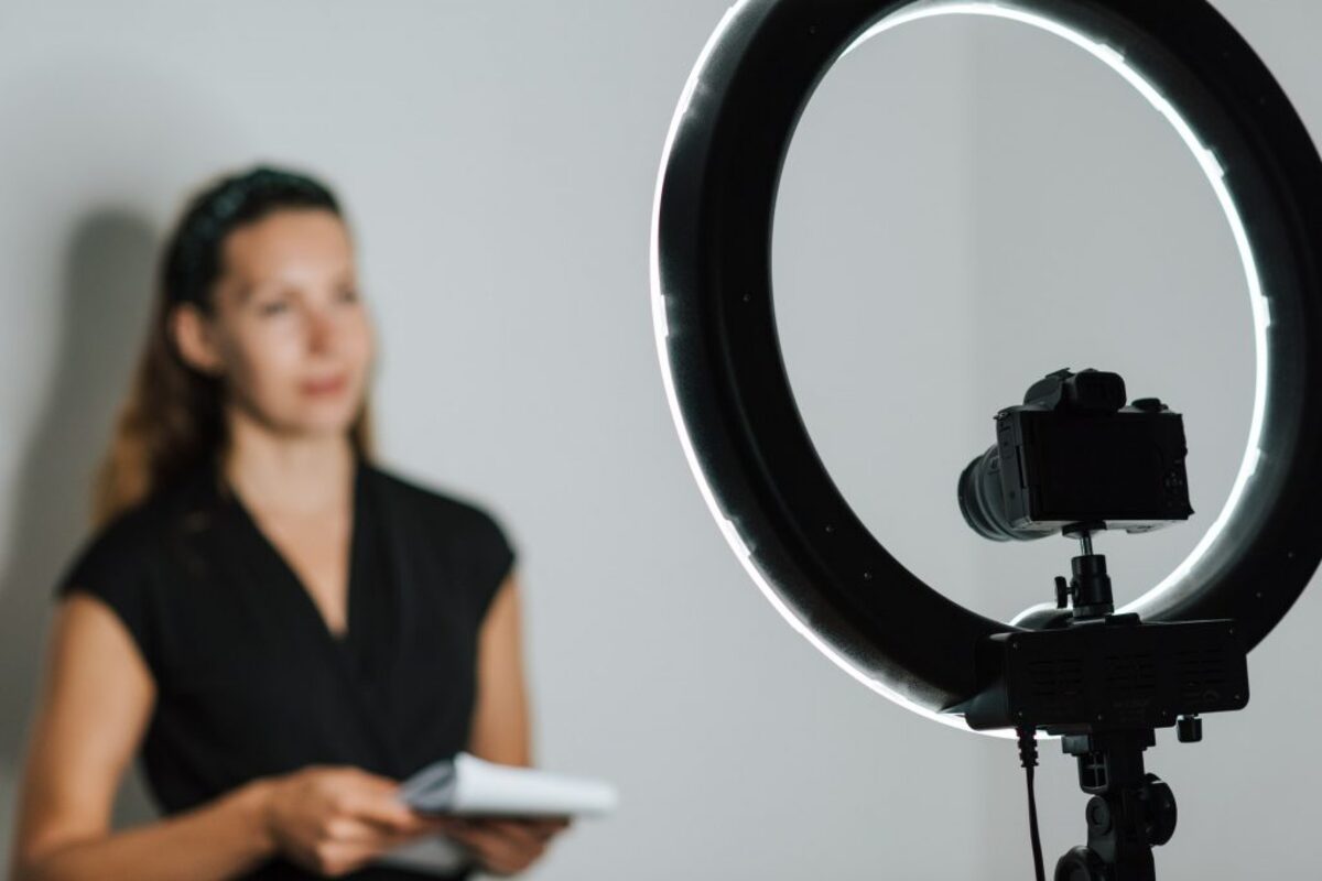 Woman in front of ring light