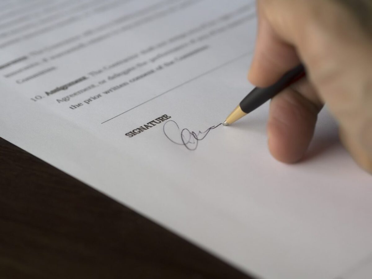 Person signing contract