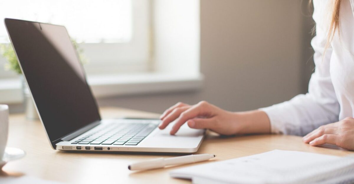 Laptop and Notepad