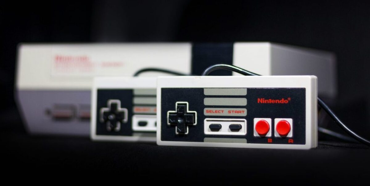 Gray nintendo nes console and controllers