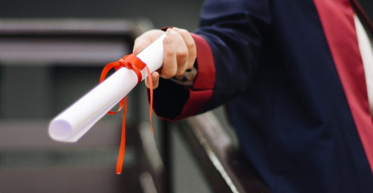 Holding a Diploma