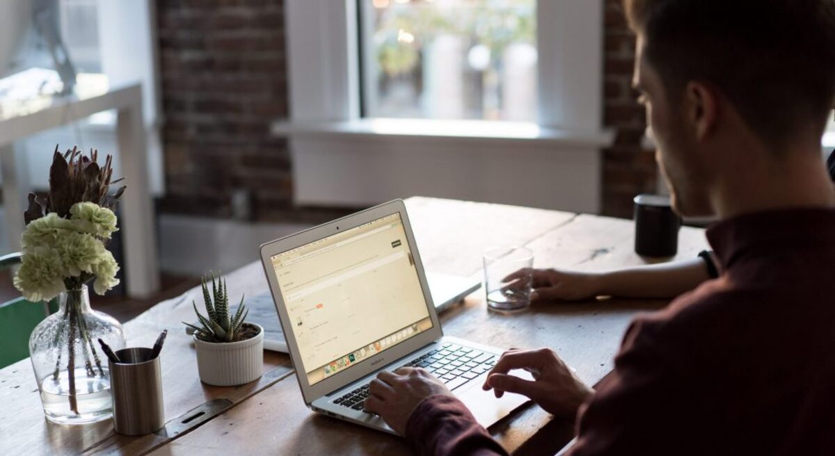 Man at a laptop in an office