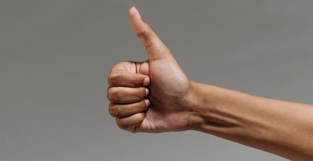 A person doing a thumbs up